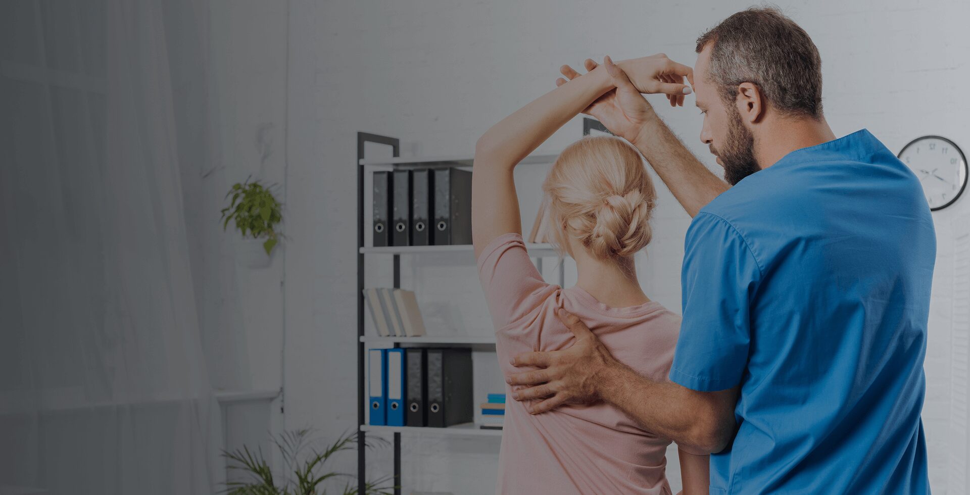 A woman receiving chiropractic care at a clinic in Richfield, MN